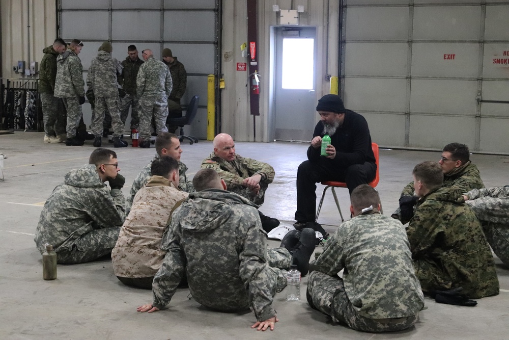 Cold-Weather Operations Course Class 20-03 students learn about equipment during training at Fort McCoy