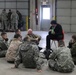 Cold-Weather Operations Course Class 20-03 students learn about equipment during training at Fort McCoy