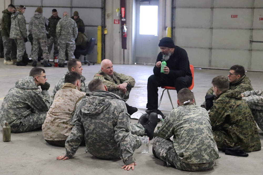 Cold-Weather Operations Course Class 20-03 students learn about equipment during training at Fort McCoy