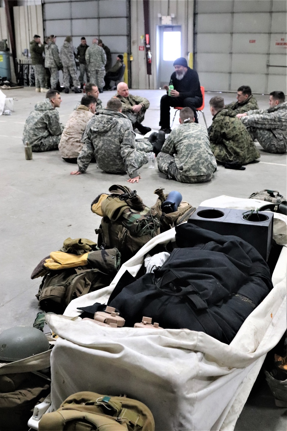 Cold-Weather Operations Course Class 20-03 students learn about equipment during training at Fort McCoy