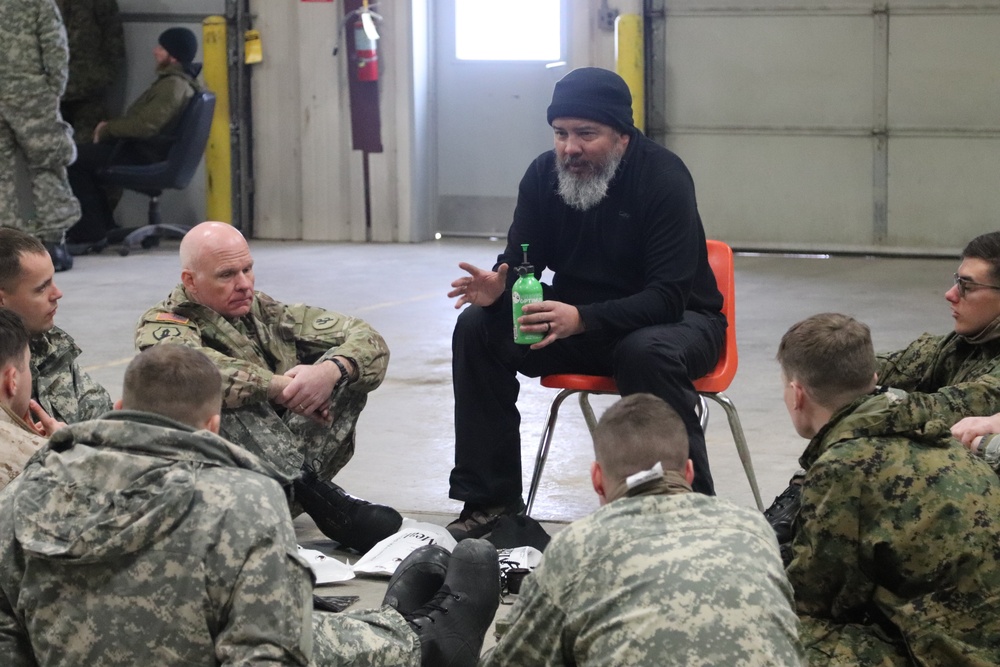 Cold-Weather Operations Course Class 20-03 students learn about equipment during training at Fort McCoy