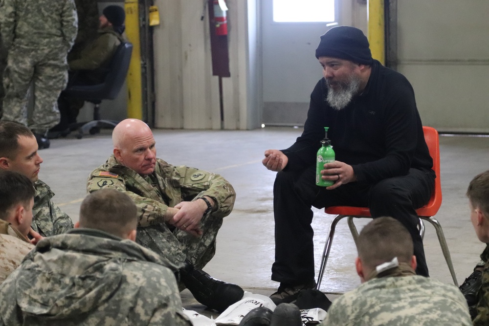 Cold-Weather Operations Course Class 20-03 students learn about equipment during training at Fort McCoy