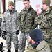 Cold-Weather Operations Course Class 20-03 students learn about equipment during training at Fort McCoy