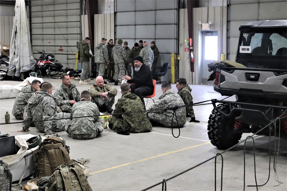 Cold-Weather Operations Course Class 20-03 students learn about equipment during training at Fort McCoy