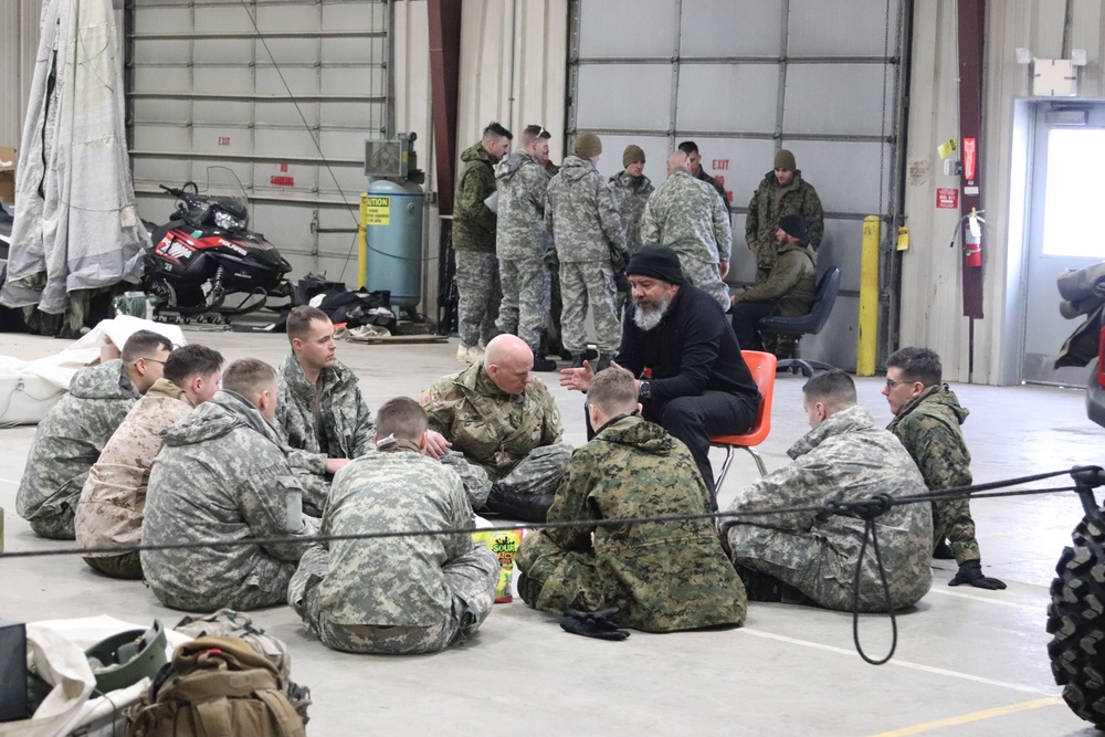 Cold-Weather Operations Course Class 20-03 students learn about equipment during training at Fort McCoy