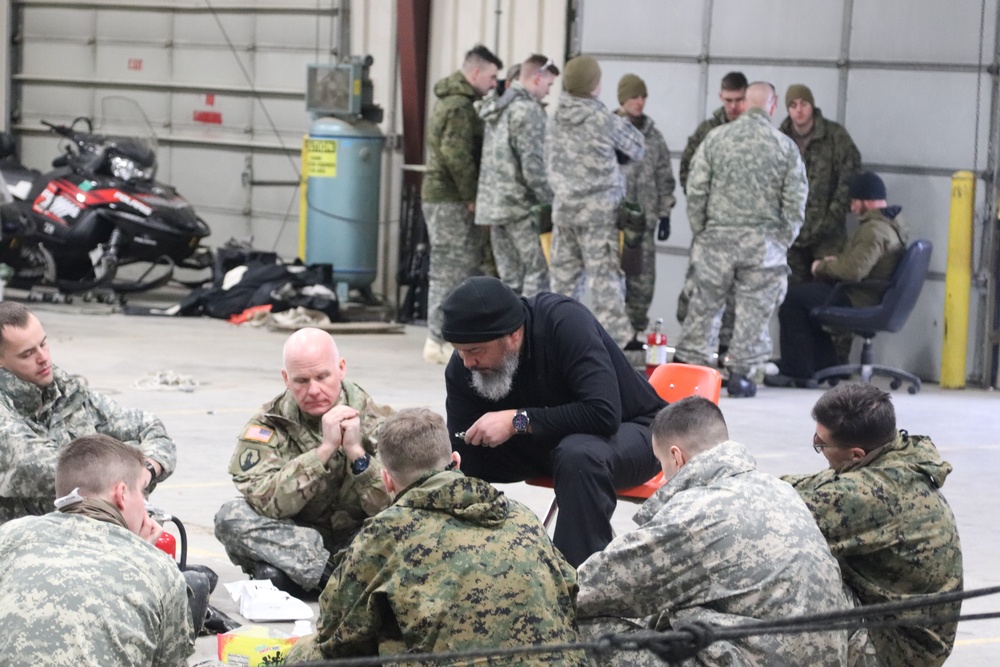 Cold-Weather Operations Course Class 20-03 students learn about equipment during training at Fort McCoy