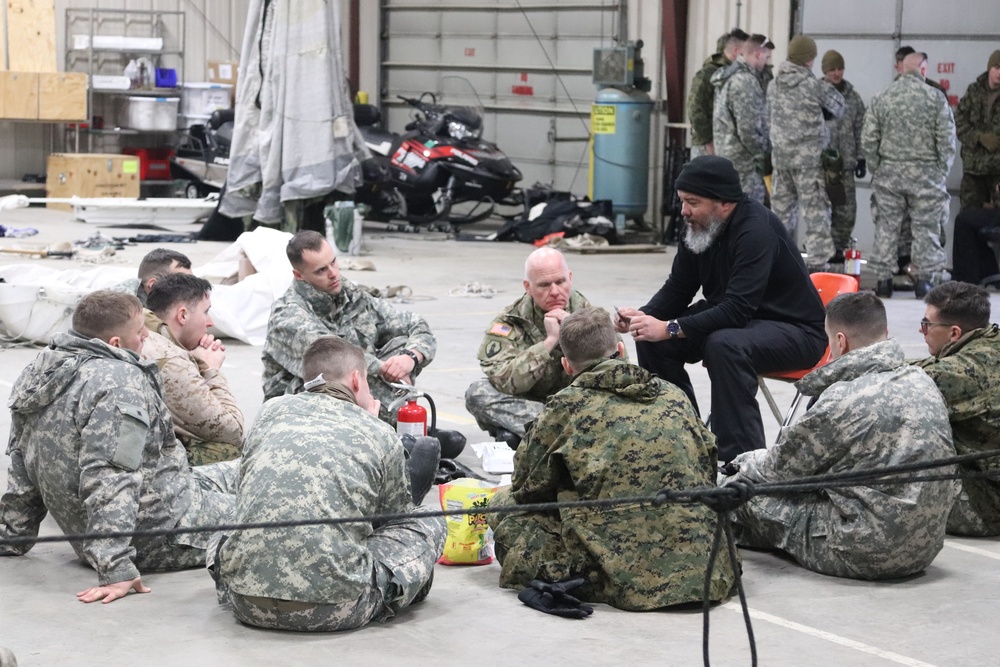 Cold-Weather Operations Course Class 20-03 students learn about equipment during training at Fort McCoy