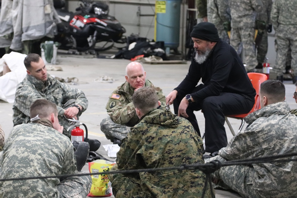 Cold-Weather Operations Course Class 20-03 students learn about equipment during training at Fort McCoy