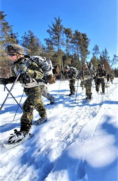 Fort McCoy Cold-Weather Operations Course Class 20-04 students practice snowshoeing, ahkio sled use at Fort McCoy
