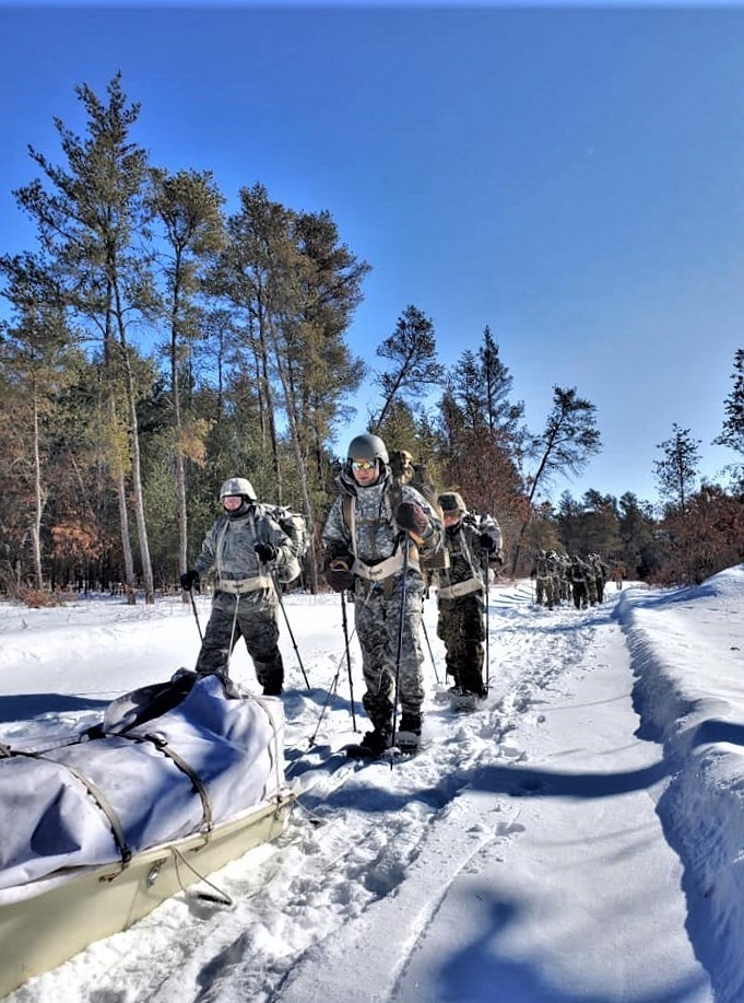 Fort McCoy Cold-Weather Operations Course Class 20-04 students practice snowshoeing, ahkio sled use at Fort McCoy