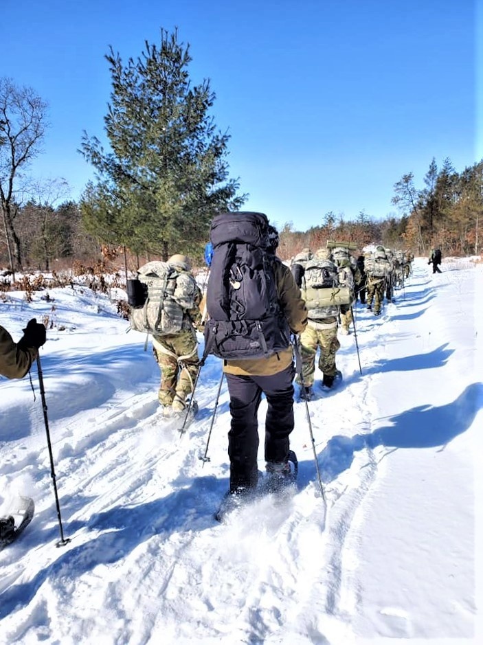 Fort McCoy Cold-Weather Operations Course Class 20-04 students practice snowshoeing, ahkio sled use at Fort McCoy