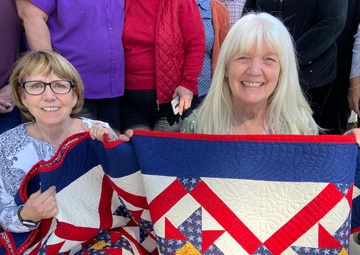 Handmade quilts are a gift from the heart to war vets
