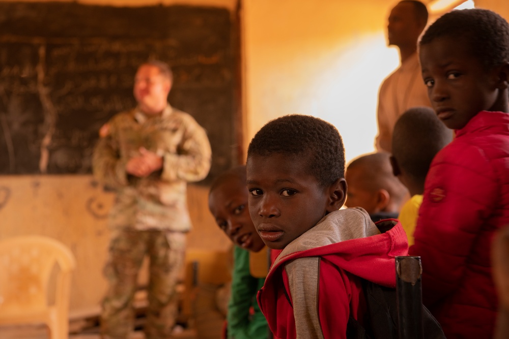 U.S. and Mauritanian Soldiers Distribute School Supplies