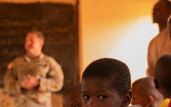 U.S. and Mauritanian Soldiers Distribute School Supplies