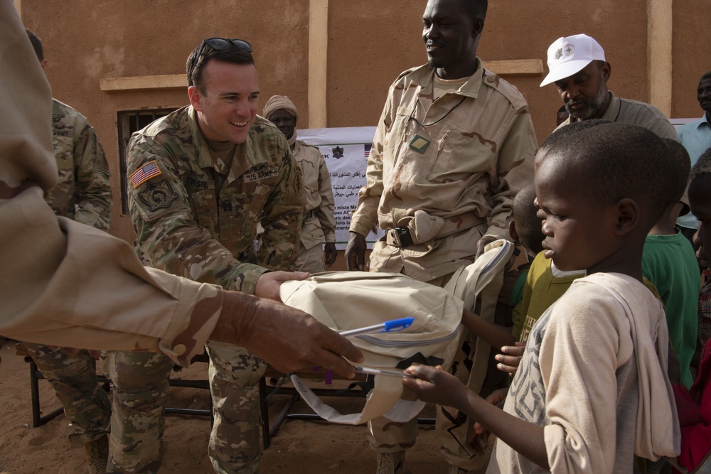 U.S. Army Civil Affairs Team, along with Mauritanian counterparts, Distribute School Supplies