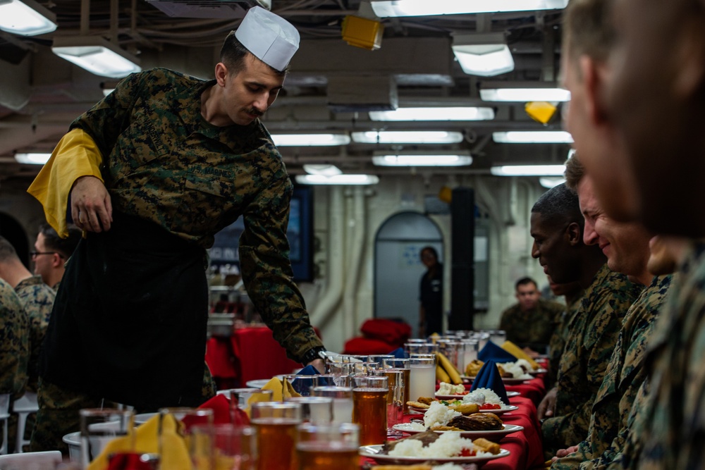 Say it ain’t so! 31st MEU Marine, Sailors conduct mess night aboard USS America