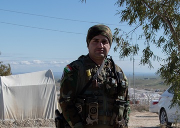 A Peshmerga soldier stands guard in northern Iraq
