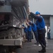 USS Green Bay (LPD 20) Sailors lower a RHIB