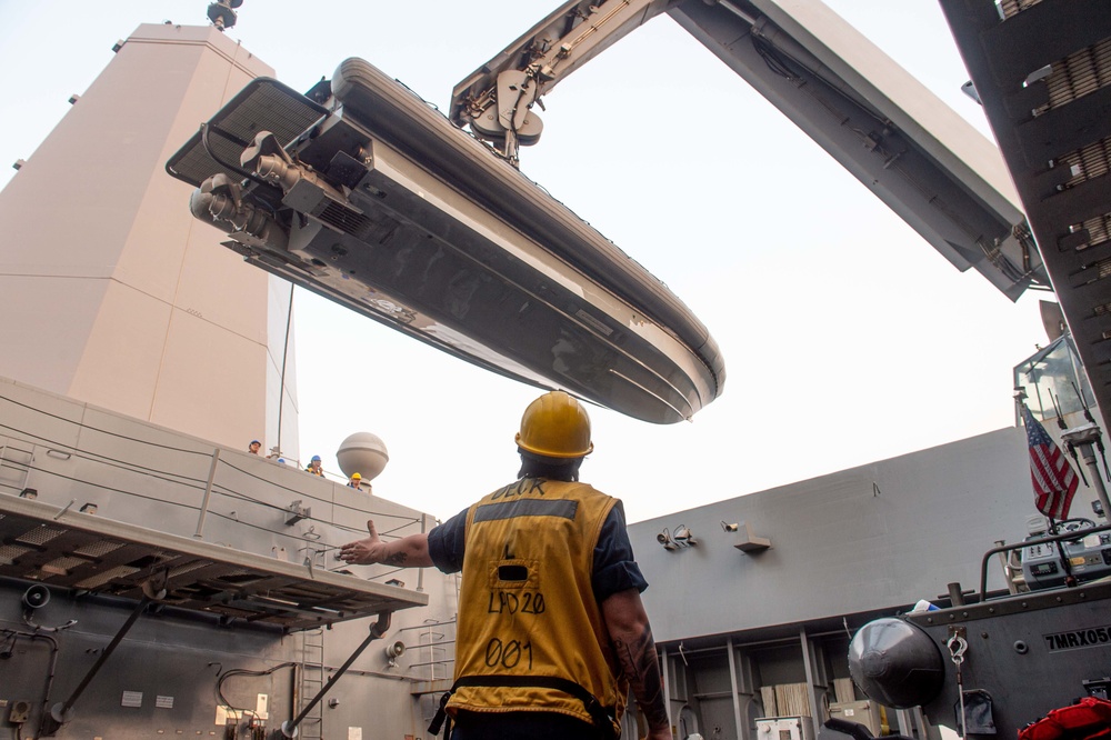 USS Green Bay (LPD 20) Sailors lower a RHIB