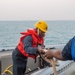 USS Green Bay (LPD 20) Sailors lower a RHIB