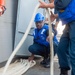 USS Green Bay (LPD 20) Sailors lower a RHIB