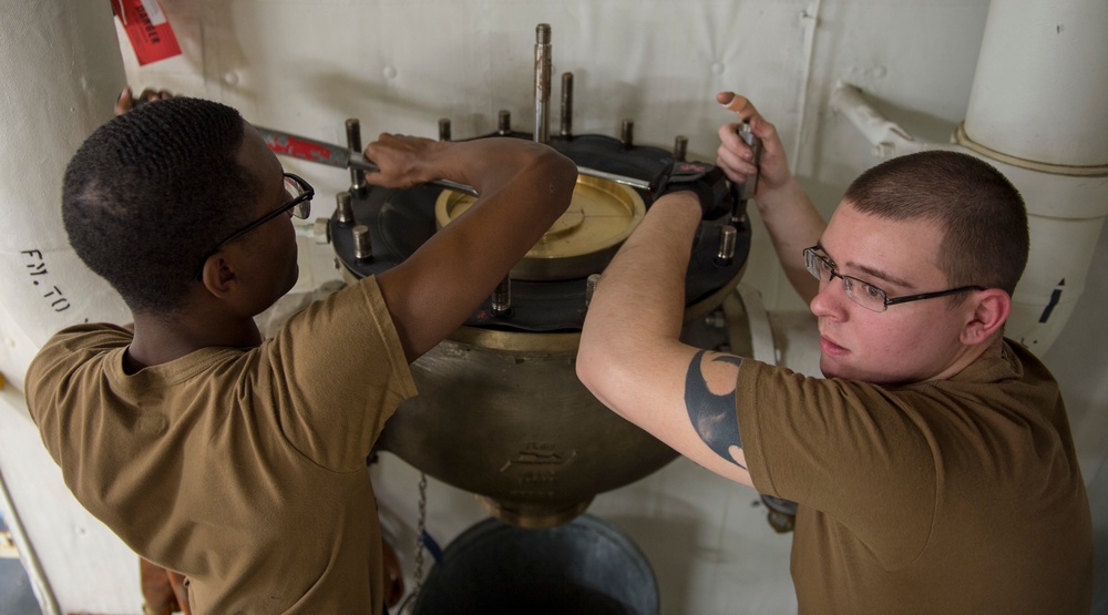 GHWB Sailors Disassemble Sprinkler System