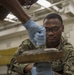 GHWB Sailors Lubricate Sprinkler System