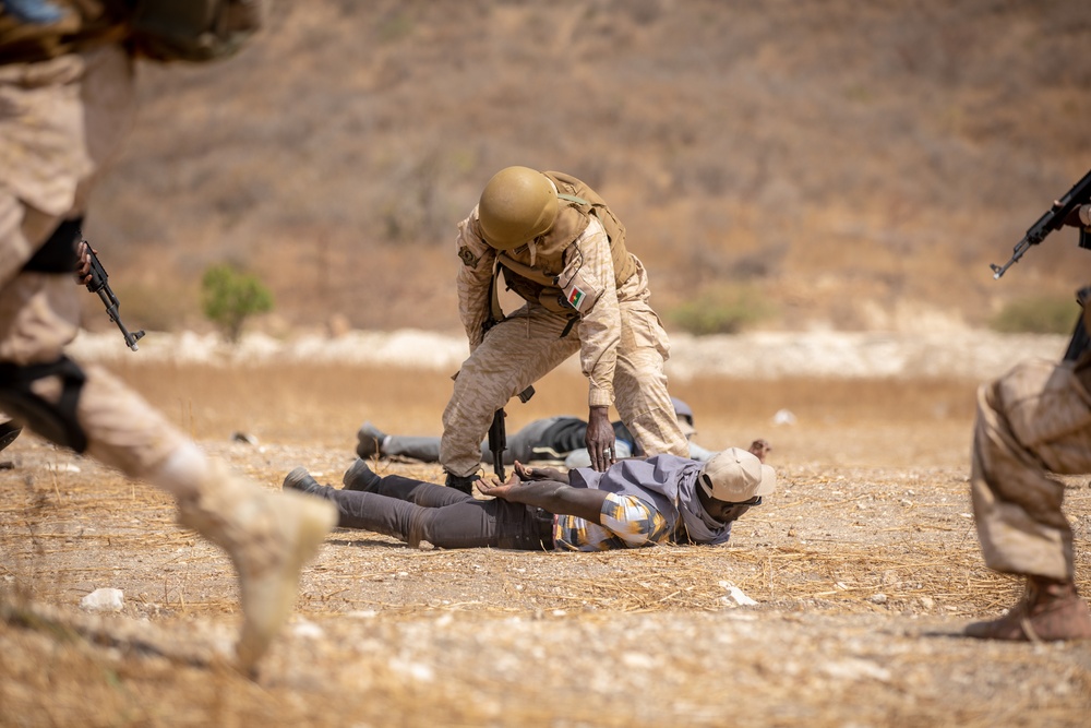 Burkinabe soldiers conduct presence patrols during Flintlock 20