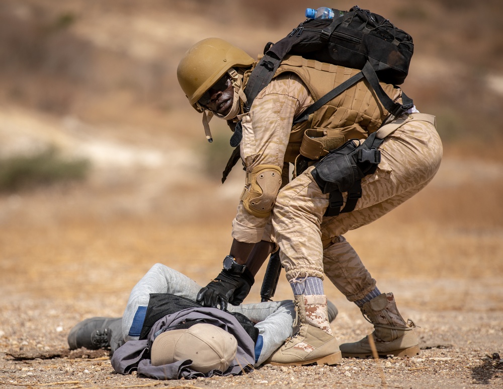 Burkinabe soldiers conduct presence patrols during Flintlock 20