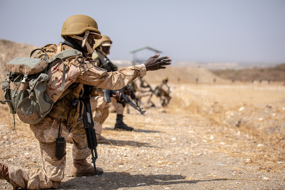 Burkinabe soldiers conduct presence patrols during Flintlock 20