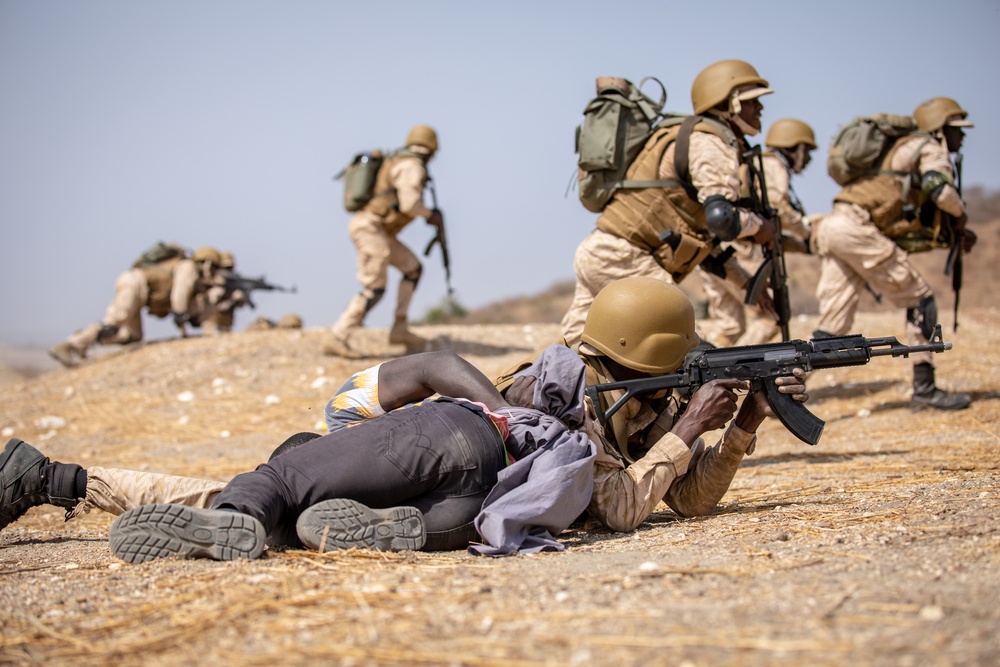 Burkinabe soldiers conduct presence patrols during Flintlock 20