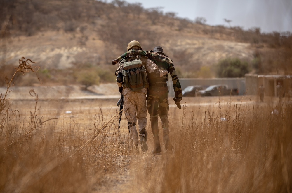 Burkinabe soldiers conduct presence patrols during Flintlock 20