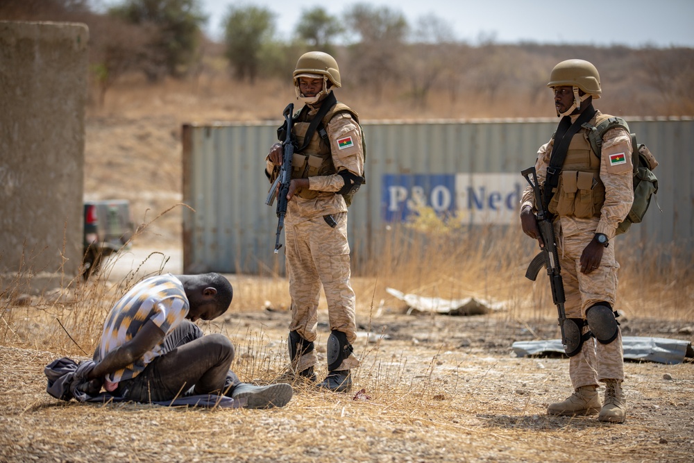 Burkinabe soldiers conduct presence patrols during Flintlock 20