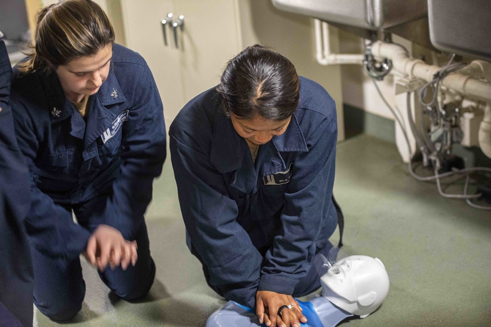 Sailors take part in a CPR class