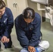 Sailors take part in a CPR class