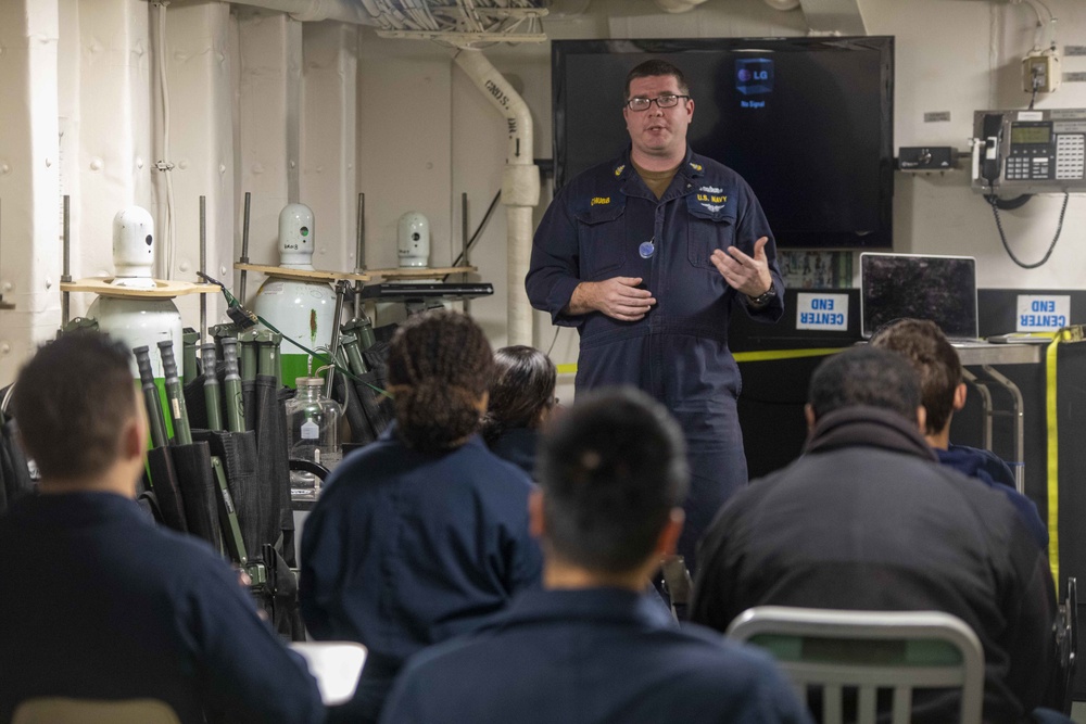 Sailors take part in a CPR class