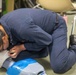 Sailors take part in a CPR class