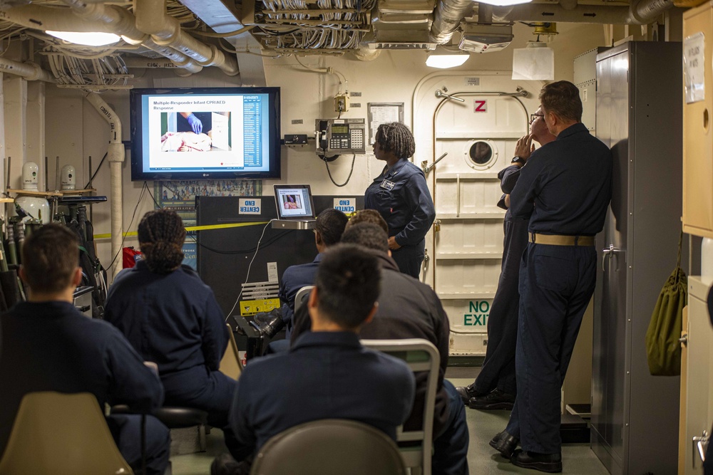 Sailors take part in a CPR class