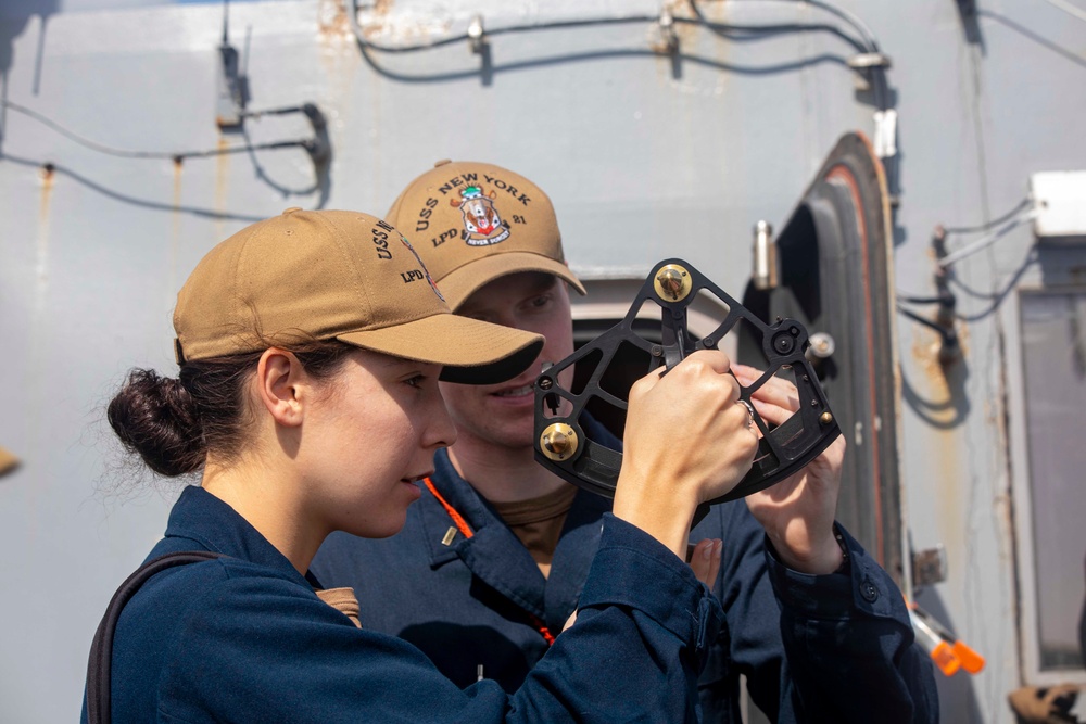 USS New York completes a RAS with the USNS William Mclean