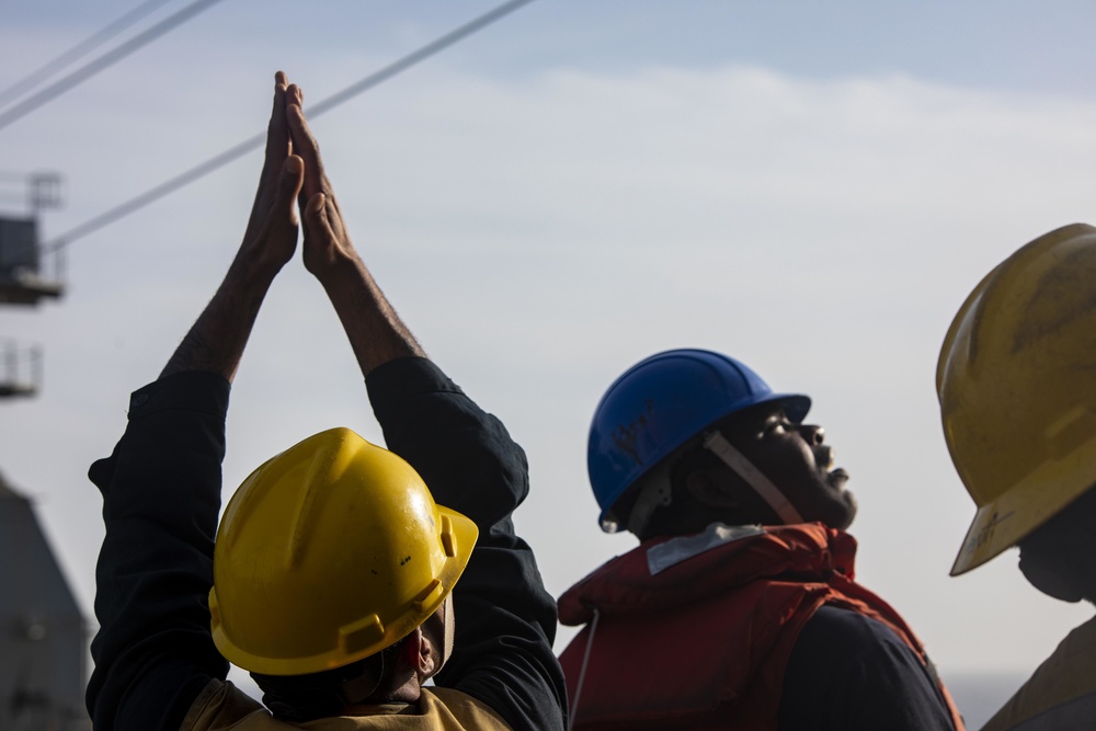 USS New York completes a RAS with the USNS William Mclean