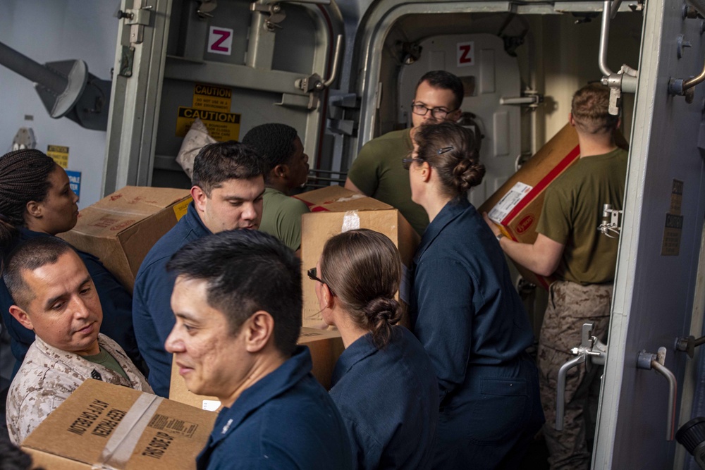 USS New York completes a RAS with the USNS William Mclean