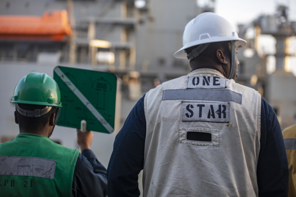 USS New York completes a RAS with the USNS William Mclean