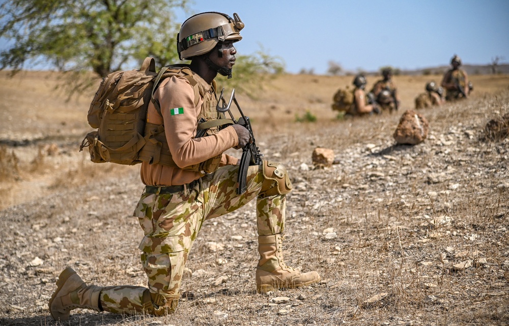 Soldier in the Nigerian Army posts as a lookout during a drill as part of FLINTLOCK 20