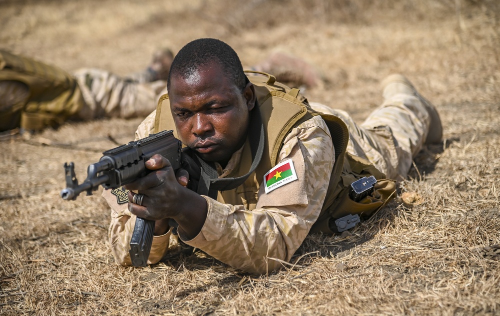 A Burkina Faso Soldier simulates conducting a patrol during FLINTLOCK 20