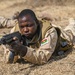 A Burkina Faso Soldier simulates conducting a patrol during FLINTLOCK 20