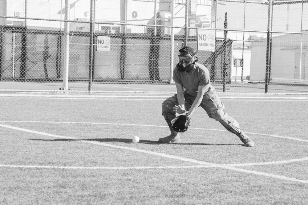 Troops echo history, play baseball