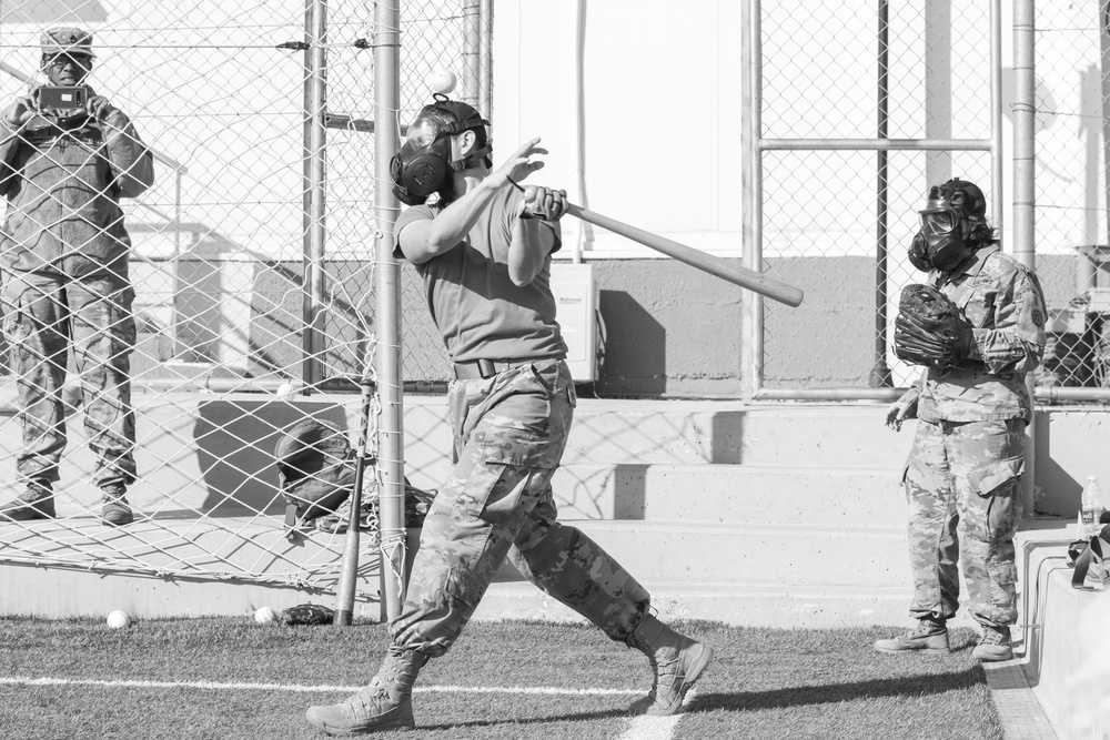 Troops echo history, play baseball