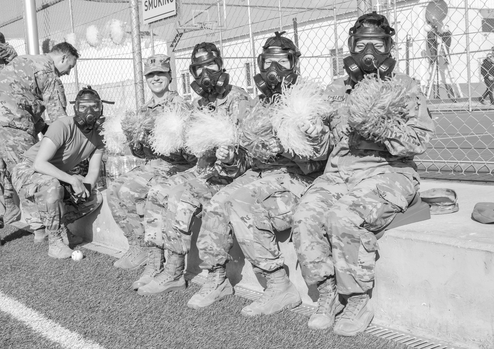 Troops echo history, play baseball