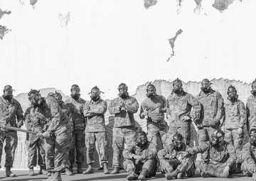 Troops echo history, play baseball