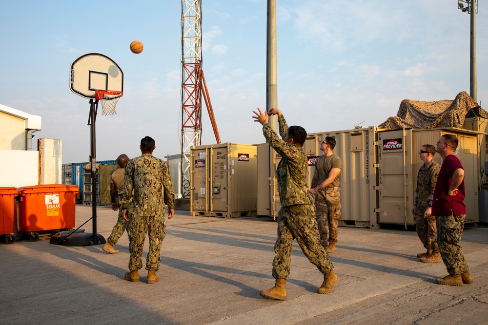 Deployed U.S. service members play basketball